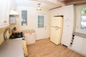 Secluded Cottage With 120 Foot Private Beach, The porch off the main house., on Cayuga Lake - Finger Lakes Region in New York - Vacation Rental - Home for rent on LakeHouseVacations.com