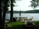 Lakehouse Vacation Rental - Lake Homes for rent on LakeHouseVacations.com, Lake property, Lake House Lake House Lake Carey Waterfront Furnished Rental House In Tunkhannock, Lakefront with picnic table, swing, and chairs., on Lake Carey in Pennsylvania - Lakehouse Vacation Rental - Lake Home for rent on LakeHouseVacations.com