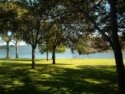 Lakehouse Vacation Rental - Lake Homes for rent on LakeHouseVacations.com, Lake property, Lake House Lake House Cottage On The Lake, Lakefront Cottage Rental, Enjoy the park-like setting and view of Lake Tawakoni from porch, on Lake Tawakoni in Texas - Lakehouse Vacation Rental - Lake Home for rent on LakeHouseVacations.com
