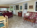 Lakehouse Vacation Rental - Lake Homes for rent on LakeHouseVacations.com, Lake property, Lake House Lake House The Lake House, Sleeping/sun porch, with view of sleeper sofa., on Billings Lake in Connecticut - Lakehouse Vacation Rental - Lake Home for rent on LakeHouseVacations.com
