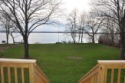 Lakehouse Vacation Rental - Lake Homes for rent on LakeHouseVacations.com, Lake property, Lake House Lake House Daddy's Lake, Level front yard between house and lake., on Cayuga Lake in New York - Lakehouse Vacation Rental - Lake Home for rent on LakeHouseVacations.com