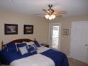 Lakehouse Vacation Rental - Lake Homes for rent on LakeHouseVacations.com, Lake property, Lake House Lake House Perfect Family Vacation, Lower Bedroom with deck access - King Bed, on Lake Of The Ozarks in Missouri - Lakehouse Vacation Rental - Lake Home for rent on LakeHouseVacations.com