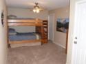 Lakehouse Vacation Rental - Lake Homes for rent on LakeHouseVacations.com, Lake property, Lake House Lake House Perfect Family Vacation, Lower Bedroom Bunks have full size mattresses and twin trundle - also with deck access, on Lake Of The Ozarks in Missouri - Lakehouse Vacation Rental - Lake Home for rent on LakeHouseVacations.com