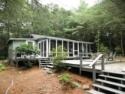 Lakehouse Vacation Rental - Lake Homes for rent on LakeHouseVacations.com, Lake property, Lake House Lake House Audubon's Mays Wildlife Refuge - Waterfront (western Coventry), View of the Cottage and decks , on Carr Pond in Rhode Island - Lakehouse Vacation Rental - Lake Home for rent on LakeHouseVacations.com