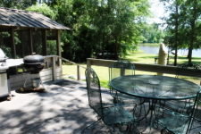 Lake House Oak Haven Lakeside Cottages - Beautiful And Private Lakefront Property, Enjoy the back deck while grillin and chillin, on Lake Murvaul in Texas - Lakehouse Vacation Rental - Lake Home for rent on LakeHouseVacations.com