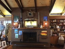Lakehouse Vacation Rental - Lake Homes for rent on LakeHouseVacations.com, Lake property, Lake House Lake House Holly Harbor, Fireplace mantel features original artwork of lake life creatures and sometimes has a fire too! ;), on Lake D Arbonne in Louisiana - Lakehouse Vacation Rental - Lake Home for rent on LakeHouseVacations.com