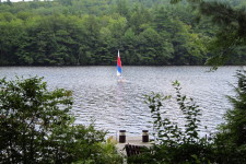 Lake House Secluded, Lakeside, Split-log Cottage With Fireplace, Rowboat, Dock and lake viewed from deck., on Lake Horace in New Hampshire - Lakehouse Vacation Rental - Lake Home for rent on LakeHouseVacations.com