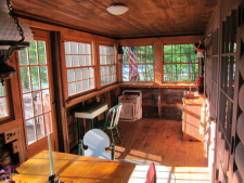 Lake House Secluded Lakeside Split-log Cottage With Fireplace, Rowboat, Eat-in porch., on Lake Horace in New Hampshire - Lakehouse Vacation Rental - Lake Home for rent on LakeHouseVacations.com