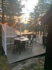 Lake House Waterfront Cottages *private Dock* Mountain Views* Sleeps 8* Seasonal, Alpine deck. Gas firepit table, party lights for after-dark enjoyment, on Lake Fairlee in Vermont - Lakehouse Vacation Rental - Lake Home for rent on LakeHouseVacations.com
