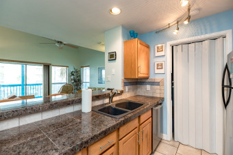 Lake House Lovely 2BR Condo w Canal & Pool View, Allocated Parking & Boat Slip!, , on Gulf of Mexico - Corpus Christi in Texas - Lakehouse Vacation Rental - Lake Home for rent on LakeHouseVacations.com