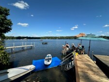 Lake House Lakeside Rustic Elegance, All new docks, plus some newer boats and just some of the fun water toys, and the Tiki umbrellas!, on Hedges Lake in New York - Lakehouse Vacation Rental - Lake Home for rent on LakeHouseVacations.com
