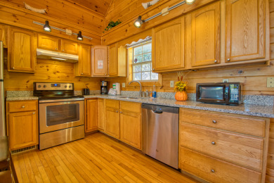 Lake House Gatlinburg's large cabin Lodge with internet, arcade, games, & pool access!, , on West Prong Little Pigeon River - Gatlinburg in Tennessee - Lakehouse Vacation Rental - Lake Home for rent on LakeHouseVacations.com