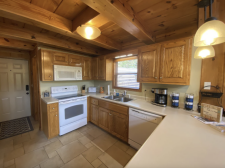 Lake House Shore To Please - Lakefront Rental Cabin, Covered Dock, Firepit, 5 Bds, 3.5 Ba, More, With the half bath right off the entry, this kitchen allows easy meal prep , on Norris Lake in Tennessee - Lakehouse Vacation Rental - Lake Home for rent on LakeHouseVacations.com