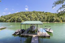 Lake House Shore To Please - Lakefront Rental Cabin, Covered Dock, Firepit, 5 Bds, 3.5 Ba, More, Covered Slip in a low-traffic cove off main channel, plus a jet ski port, on Norris Lake in Tennessee - Lakehouse Vacation Rental - Lake Home for rent on LakeHouseVacations.com