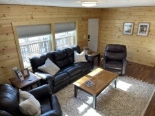 Lakehouse Vacation Rental - Lake Homes for rent on LakeHouseVacations.com, Lake property, Lake House Lake House Cottage With A Dock On The Water, Living Room, on Lake Barkley in Kentucky - Lakehouse Vacation Rental - Lake Home for rent on LakeHouseVacations.com