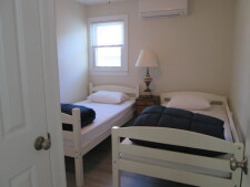 Lake House Newly Renovatored Waterfront With Central Air, Private Dock And Electric Boat, bedroom with 2 twins, on Amston Lake in Connecticut - Lakehouse Vacation Rental - Lake Home for rent on LakeHouseVacations.com