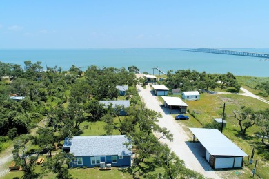 Lake House Super cute cottage with a modern flare! Pier! Kayak ramps! Very Private!, , on Gulf of Mexico - Aransas Bay in Texas - Lakehouse Vacation Rental - Lake Home for rent on LakeHouseVacations.com