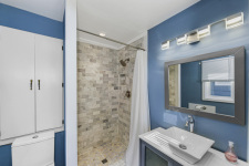 Lake House Lake Front On Lake Wawasee, Master bedroom, bathroom, walk-in shower, on Lake Wawasee in Indiana - Lakehouse Vacation Rental - Lake Home for rent on LakeHouseVacations.com