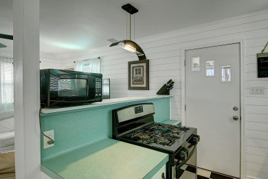 Lake House Romantic storybook cottage nestled in the bougainvillea of old town Port A!, , on Gulf of Mexico - Port Aransas in Texas - Lakehouse Vacation Rental - Lake Home for rent on LakeHouseVacations.com