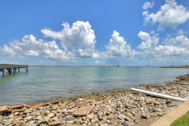 Lake House Spacious condo with a HEATED community pool. Private Pier! , , on Gulf of Mexico - Port Aransas in Texas - Lakehouse Vacation Rental - Lake Home for rent on LakeHouseVacations.com