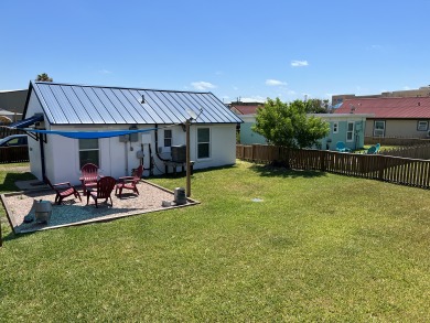 Lake House Spanish Village Cottage, pet friendly, fully fenced with large yard space!, , on Gulf of Mexico - Port Aransas in Texas - Lakehouse Vacation Rental - Lake Home for rent on LakeHouseVacations.com