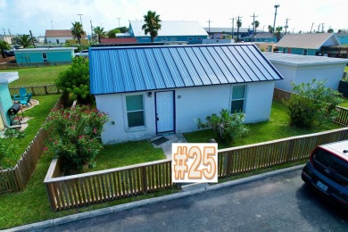 Lake House Spanish Village Cottage, pet friendly, fully fenced with large yard space!, , on Gulf of Mexico - Port Aransas in Texas - Lakehouse Vacation Rental - Lake Home for rent on LakeHouseVacations.com