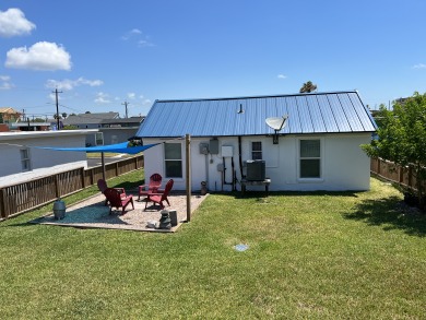 Lake House Spanish Village Cottage, pet friendly, fully fenced with large yard space!, , on Gulf of Mexico - Port Aransas in Texas - Lakehouse Vacation Rental - Lake Home for rent on LakeHouseVacations.com