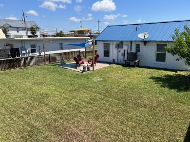 Lake House Spanish Village Cottage, pet friendly, fully fenced with large yard space!, , on Gulf of Mexico - Port Aransas in Texas - Lakehouse Vacation Rental - Lake Home for rent on LakeHouseVacations.com