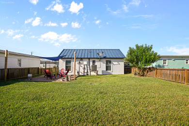 Lake House Spanish Village Cottage, pet friendly, fully fenced with large yard space!, , on Gulf of Mexico - Port Aransas in Texas - Lakehouse Vacation Rental - Lake Home for rent on LakeHouseVacations.com