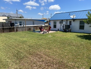 Lake House Spanish Village Cottage, pet friendly, fully fenced with large yard space!, , on Gulf of Mexico - Port Aransas in Texas - Lakehouse Vacation Rental - Lake Home for rent on LakeHouseVacations.com