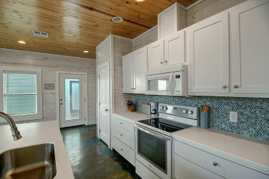 Lake House Lovely home in FABULOUS Village Walk, In-town Gated Community, 2 heated pools, , on Gulf of Mexico - Port Aransas in Texas - Lakehouse Vacation Rental - Lake Home for rent on LakeHouseVacations.com