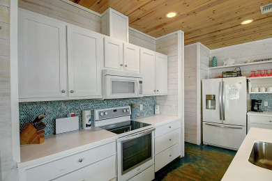 Lake House Lovely home in FABULOUS Village Walk, In-town Gated Community, 2 heated pools, , on Gulf of Mexico - Port Aransas in Texas - Lakehouse Vacation Rental - Lake Home for rent on LakeHouseVacations.com