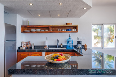 Lake House Upscale, comfortable beachfront condo with pool, AC and WiFi!, , on  in Quintana Roo - Lakehouse Vacation Rental - Lake Home for rent on LakeHouseVacations.com