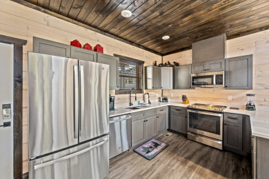 Lake House Brand New - Amazing Indoor Pool Cabin, Game Room, Outdoor Living, , on West Prong Little Pigeon River in Tennessee - Lakehouse Vacation Rental - Lake Home for rent on LakeHouseVacations.com