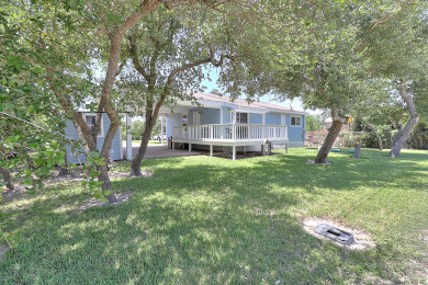 Lake House Private deck, boat parking, 2 bedroom 2 bath coastal cottage in Holiday Beach, , on Gulf of Mexico - Aransas Bay in Texas - Lakehouse Vacation Rental - Lake Home for rent on LakeHouseVacations.com