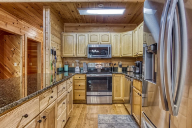 Lake House Get Hugged By Comfort - 3-Story Cabin with Rustic Charm in Sevierville!, , on Douglas Lake in Tennessee - Lakehouse Vacation Rental - Lake Home for rent on LakeHouseVacations.com
