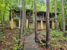 Lakehouse Vacation Rental - Lake Homes for rent on LakeHouseVacations.com, Lake property, Lake House Lake House Secluded 2 Bedroom Lakefront Cabin With Detached Bunkhouse/office/flex Space, Lakeside of home., on Roxboro Lake in North Carolina - Lakehouse Vacation Rental - Lake Home for rent on LakeHouseVacations.com