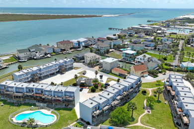 Lake House Sunset view over the city marina while relaxing on the open deck, , on Gulf of Mexico - Port Aransas in Texas - Lakehouse Vacation Rental - Lake Home for rent on LakeHouseVacations.com