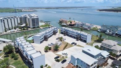 Lake House Sunset view over the city marina while relaxing on the open deck, , on Gulf of Mexico - Port Aransas in Texas - Lakehouse Vacation Rental - Lake Home for rent on LakeHouseVacations.com
