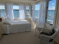 Lakehouse Vacation Rental - Lake Homes for rent on LakeHouseVacations.com, Lake property, Lake House Lake House Cozy Beach Cottage On Charming Lake, Downstairs front bedroom with lake view., on Klinger Lake in Michigan - Lakehouse Vacation Rental - Lake Home for rent on LakeHouseVacations.com