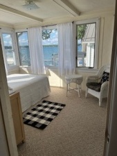 Lakehouse Vacation Rental - Lake Homes for rent on LakeHouseVacations.com, Lake property, Lake House Lake House Cozy Beach Cottage On Charming Lake, Lake view from downstairs bedroom., on Klinger Lake in Michigan - Lakehouse Vacation Rental - Lake Home for rent on LakeHouseVacations.com