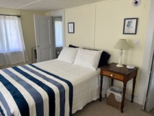 Lakehouse Vacation Rental - Lake Homes for rent on LakeHouseVacations.com, Lake property, Lake House Lake House Cozy Beach Cottage On Charming Lake, Downstairs back bedroom, on Klinger Lake in Michigan - Lakehouse Vacation Rental - Lake Home for rent on LakeHouseVacations.com