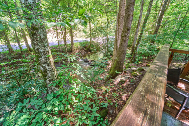 Lake House Enjoy the creek, fire pit, hot tub and swing set- sleeps 14 guests, , on  in Tennessee - Lakehouse Vacation Rental - Lake Home for rent on LakeHouseVacations.com
