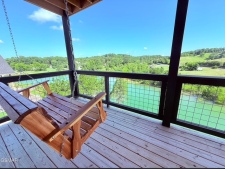 Lakehouse Vacation Rental - Lake Homes for rent on LakeHouseVacations.com, Lake property, Lake House Lake House Large Luxury Lakehouse Close To Pigeon Forge!, Enjoy the view while Swinging!, on Douglas Lake in Tennessee - Lakehouse Vacation Rental - Lake Home for rent on LakeHouseVacations.com