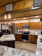 Lakehouse Vacation Rental - Lake Homes for rent on LakeHouseVacations.com, Lake property, Lake House Lake House Large Luxury Lakehouse Close To Pigeon Forge!, Granite countertops and stainless steel appliances, on Douglas Lake in Tennessee - Lakehouse Vacation Rental - Lake Home for rent on LakeHouseVacations.com