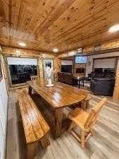 Lakehouse Vacation Rental - Lake Homes for rent on LakeHouseVacations.com, Lake property, Lake House Lake House Large Luxury Lakehouse Close To Pigeon Forge!, Large living room with fireplace and dining table that seats 12, on Douglas Lake in Tennessee - Lakehouse Vacation Rental - Lake Home for rent on LakeHouseVacations.com