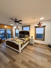 Lakehouse Vacation Rental - Lake Homes for rent on LakeHouseVacations.com, Lake property, Lake House Lake House Large Luxury Lakehouse Close To Pigeon Forge!, Large Master King Ensuite with fireplace, tv, and more, on Douglas Lake in Tennessee - Lakehouse Vacation Rental - Lake Home for rent on LakeHouseVacations.com