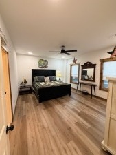 Lakehouse Vacation Rental - Lake Homes for rent on LakeHouseVacations.com, Lake property, Lake House Lake House Large Luxury Lakehouse Close To Pigeon Forge!, Second King ensuite with wardrobe, tv, large bathroom, on Douglas Lake in Tennessee - Lakehouse Vacation Rental - Lake Home for rent on LakeHouseVacations.com