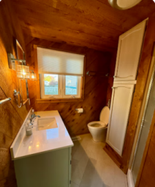 Lakehouse Vacation Rental - Lake Homes for rent on LakeHouseVacations.com, Lake property, Lake House Lake House Wawasee Lakefront Rental - Private Cottage - 60' Of Frontage, Lower level cedar walled bathroom, on Lake Wawasee in Indiana - Lakehouse Vacation Rental - Lake Home for rent on LakeHouseVacations.com