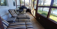 Lakehouse Vacation Rental - Lake Homes for rent on LakeHouseVacations.com, Lake property, Lake House Lake House Rocking L Ranch House On Waterfront, Screened Patio w Grill , on Cedar Creek Lake in Texas - Lakehouse Vacation Rental - Lake Home for rent on LakeHouseVacations.com